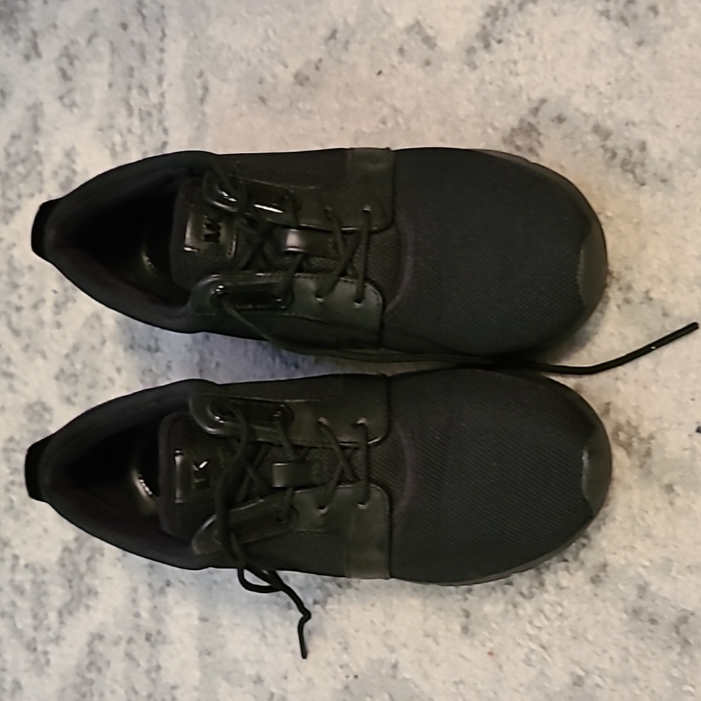 Excellent condition michael kors sneakers black and leopard